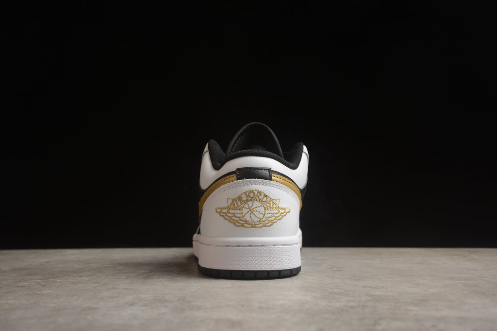 Jordan 1 Low – Blanco / Negro / Dorado