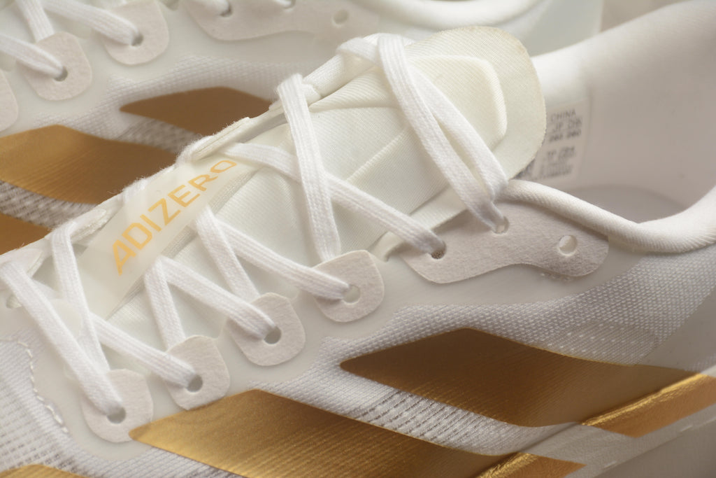 Adidas Adizero Evo SL – Blanco / Dorado