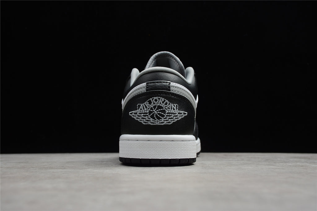 Jordan 1 Low – Negro / Blanco / Gris