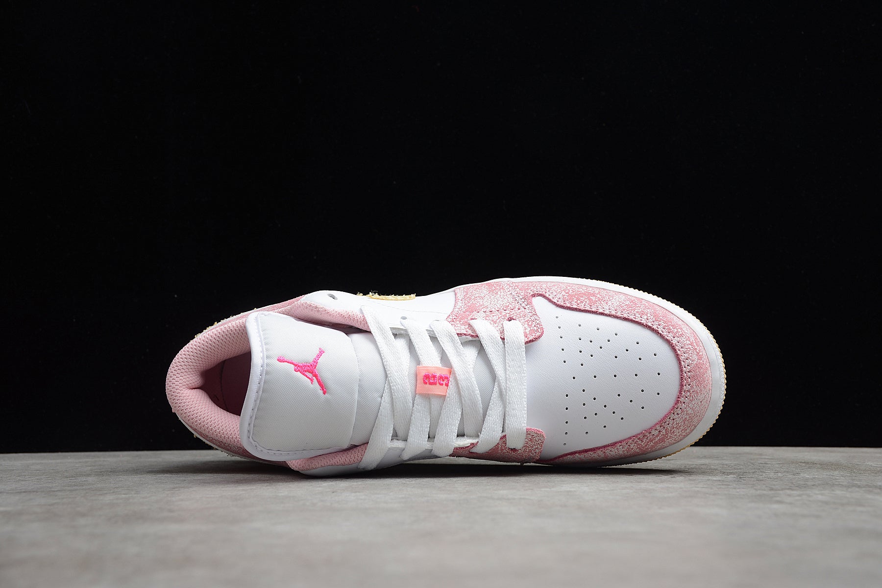 Jordan 1 Low – Rosa / Blanco / Negro
