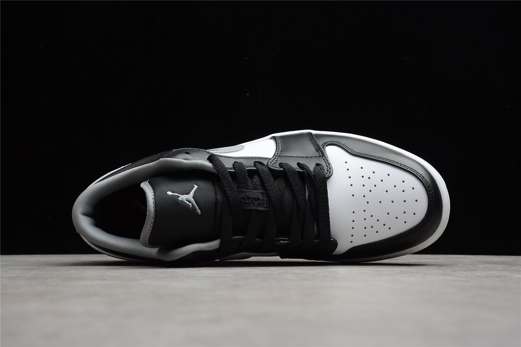 Jordan 1 Low – Negro / Blanco / Gris