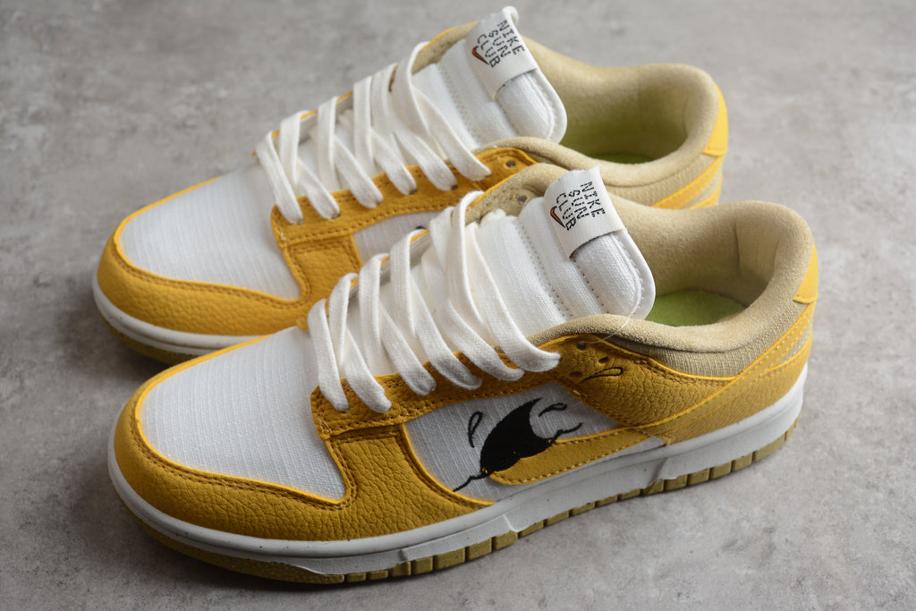 Dunk SB – Amarillo / Blanco / Negro