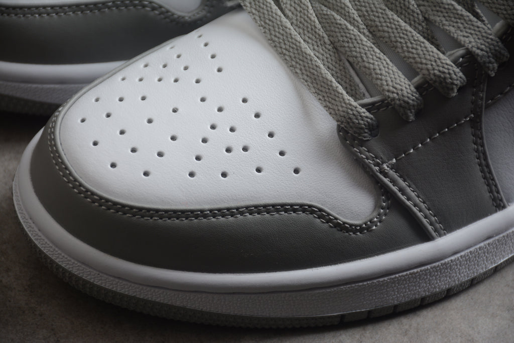 Jordan 1 Low – Gris / Azul / Blanco