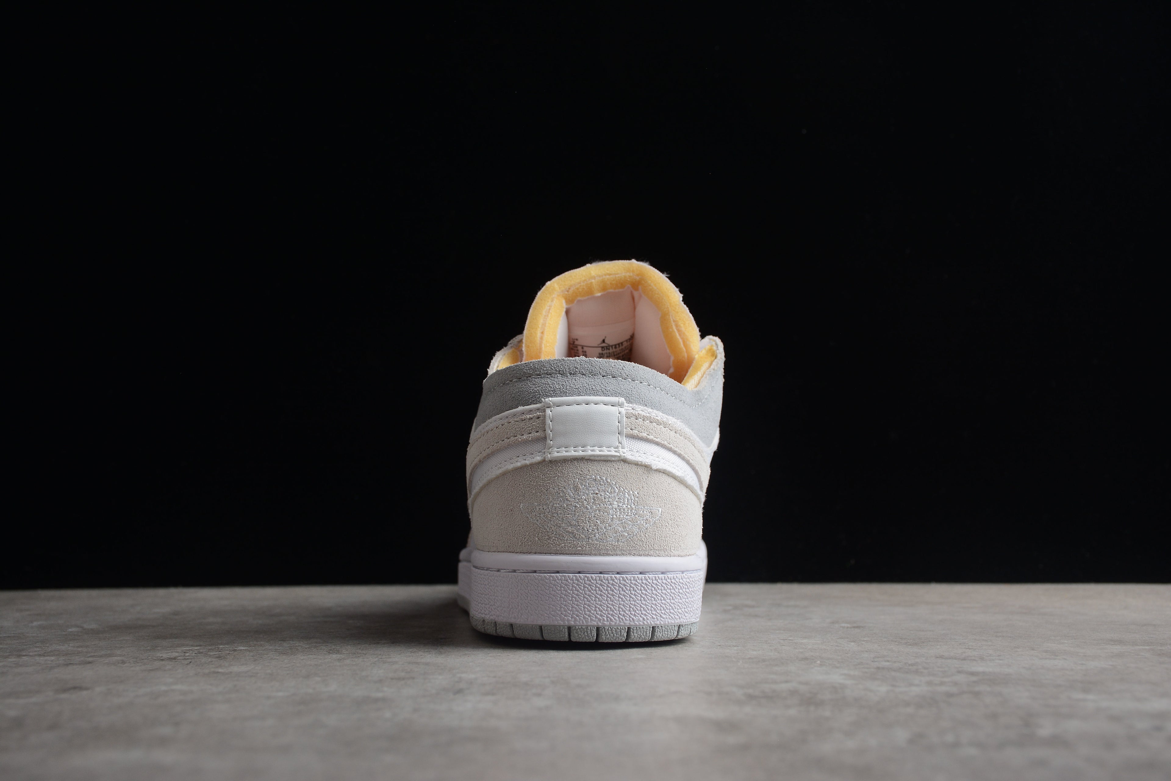 Jordan 1 Low – Gris / Blanco