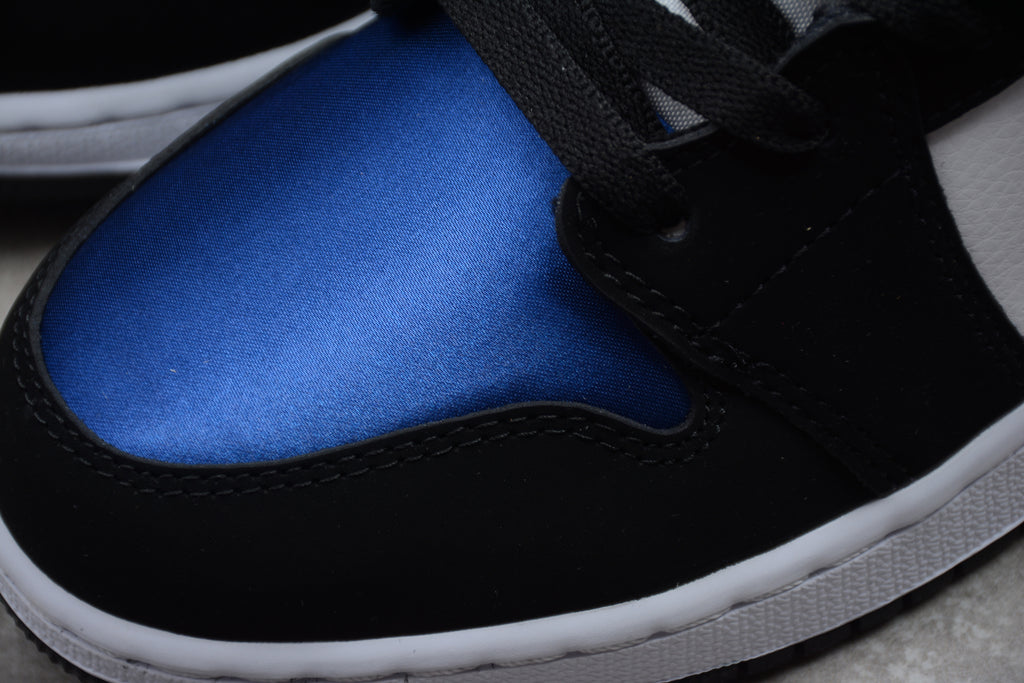 Air Jordan 1 Mid – Negro / Azul / Rojo