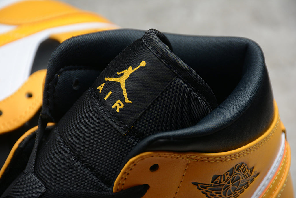 Air Jordan 1 Mid – Amarillo / Blanco / Negro