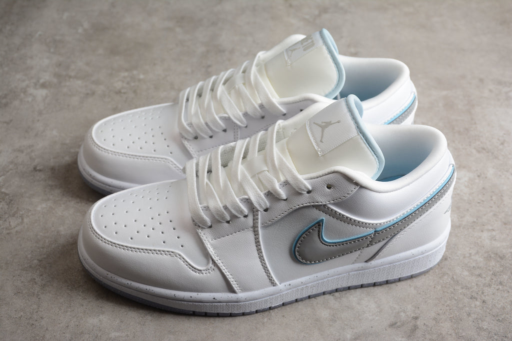 Jordan 1 Low – Blanco / Gris