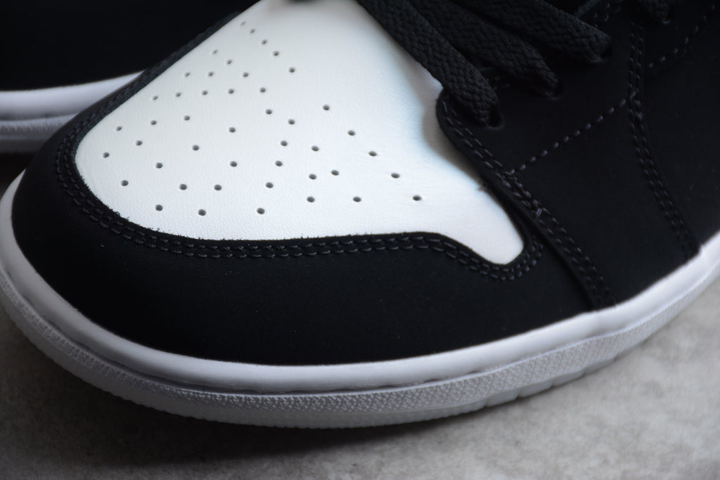 Jordan 1 Low – Negro / Blanco
