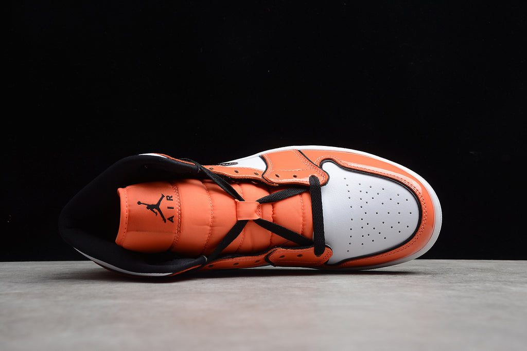 Air Jordan 1 Mid – Naranja / Negro