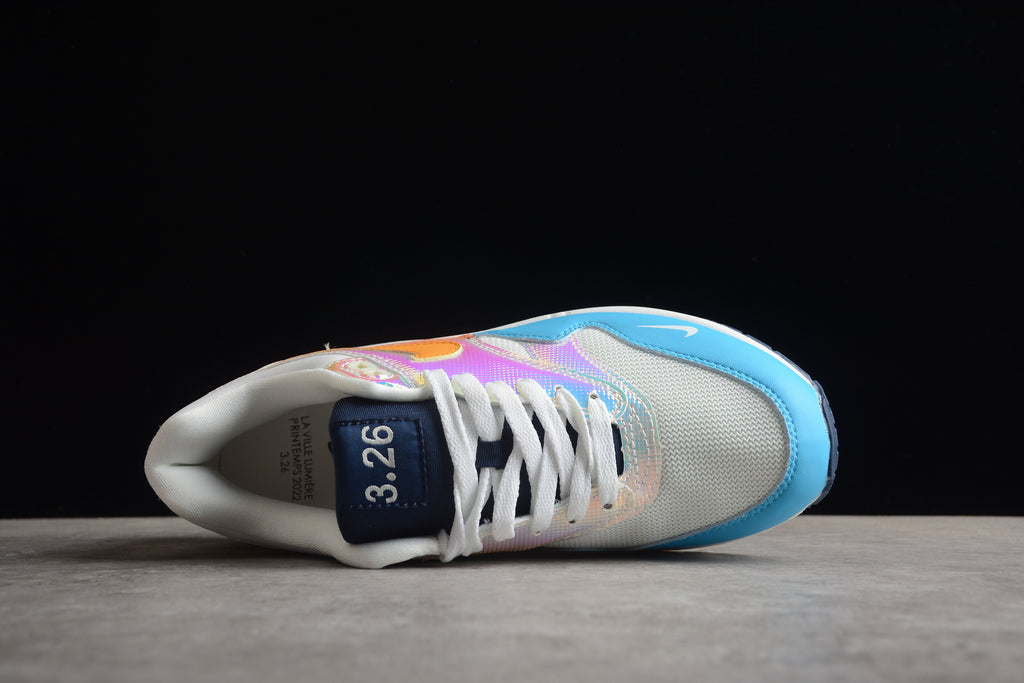 Air Max 1 – Gris / Naranja / Azul