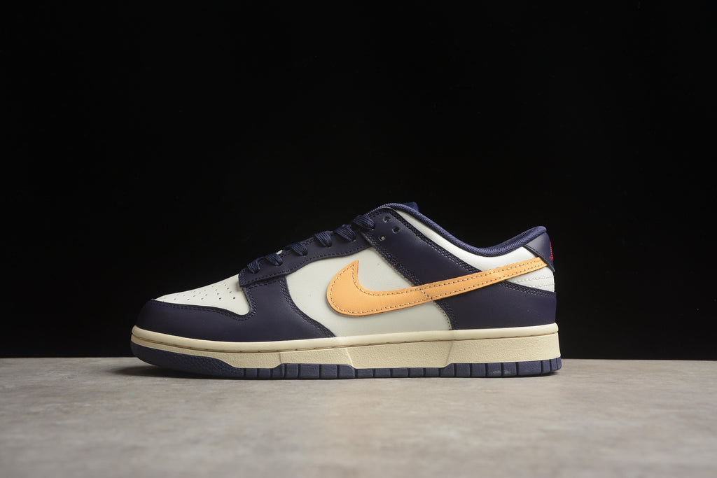 Dunk SB – Azul Oscuro / Blanco / Amarillo