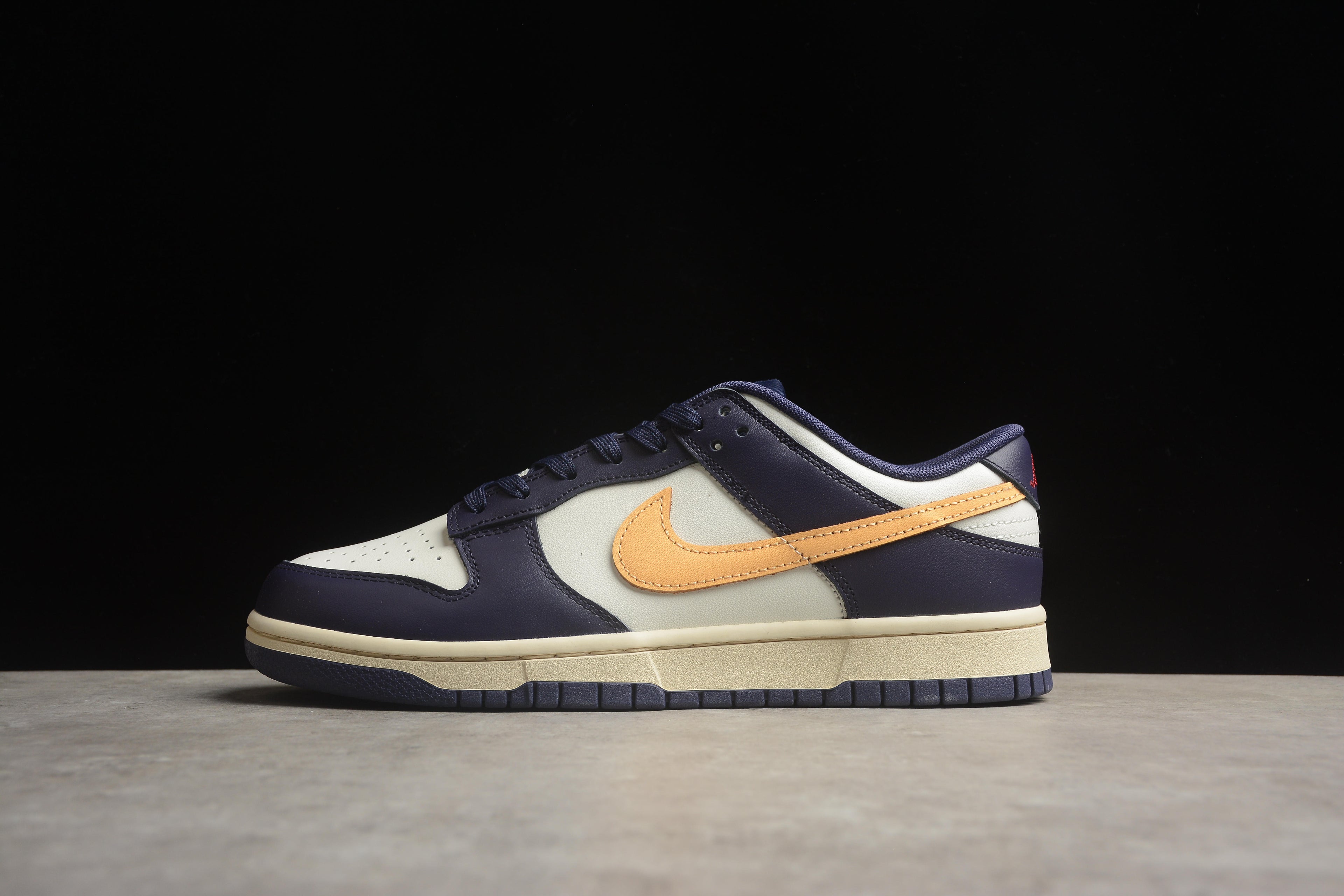 Dunk SB – Azul Oscuro / Blanco / Amarillo