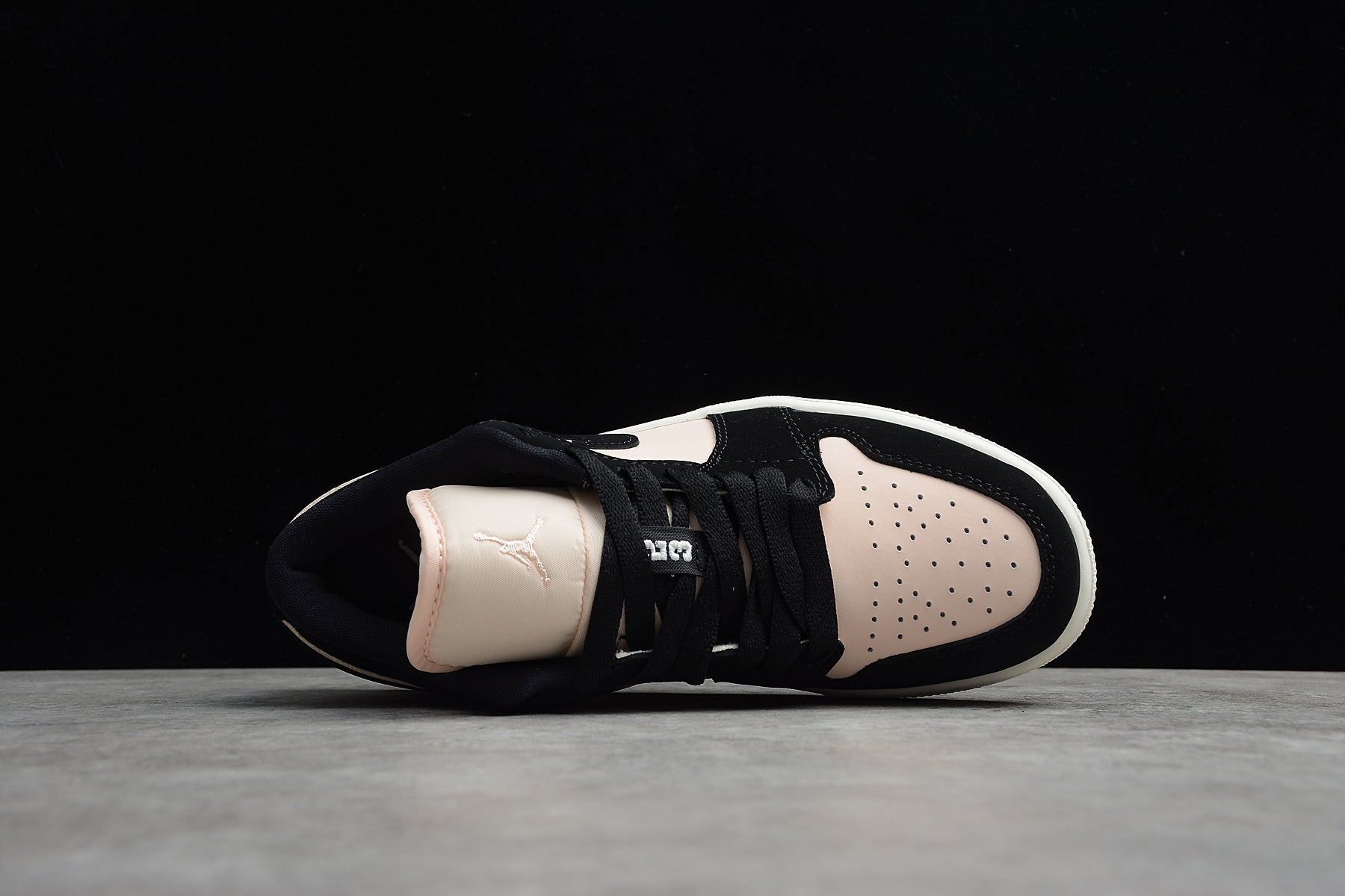 Jordan 1 Low – Negro / Rosa