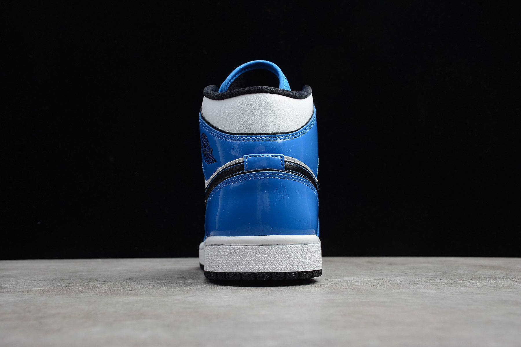 Air Jordan 1 Mid – Azul / Negro