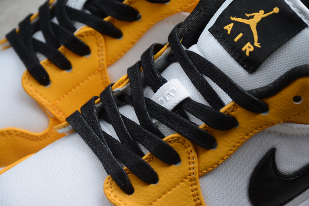Jordan 1 Low – Amarillo / Blanco