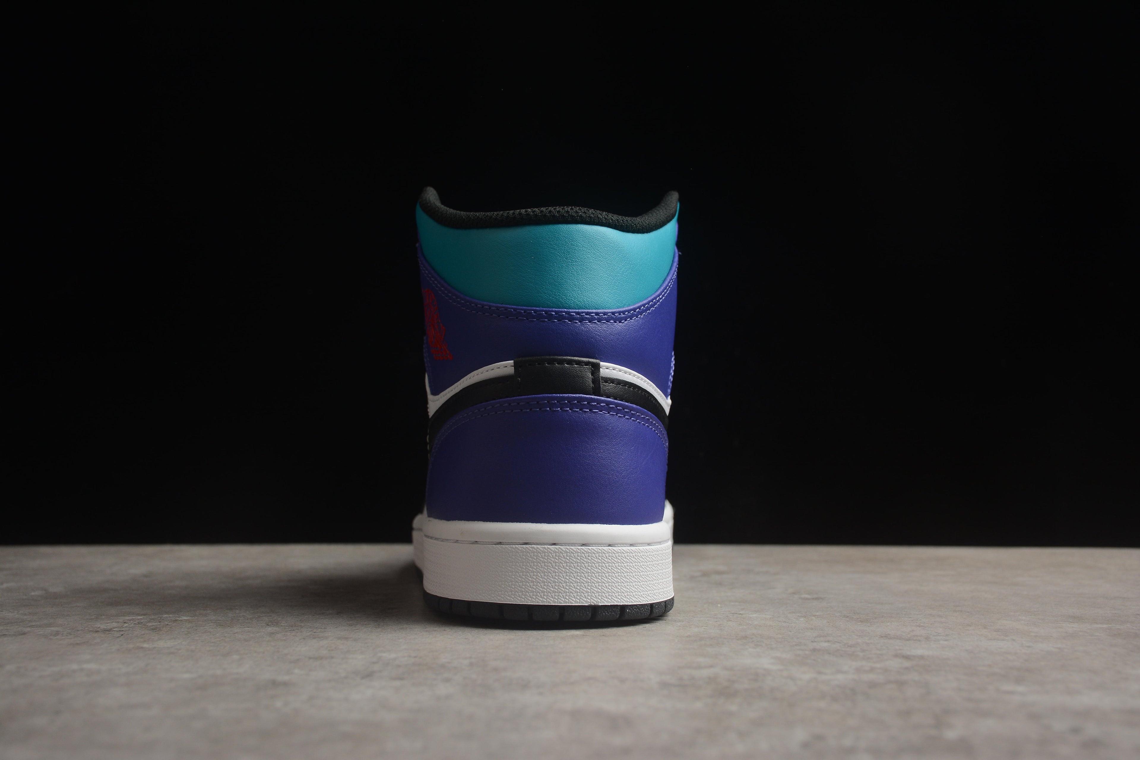 Air Jordan 1 Mid – Negro / Azul / Blanco