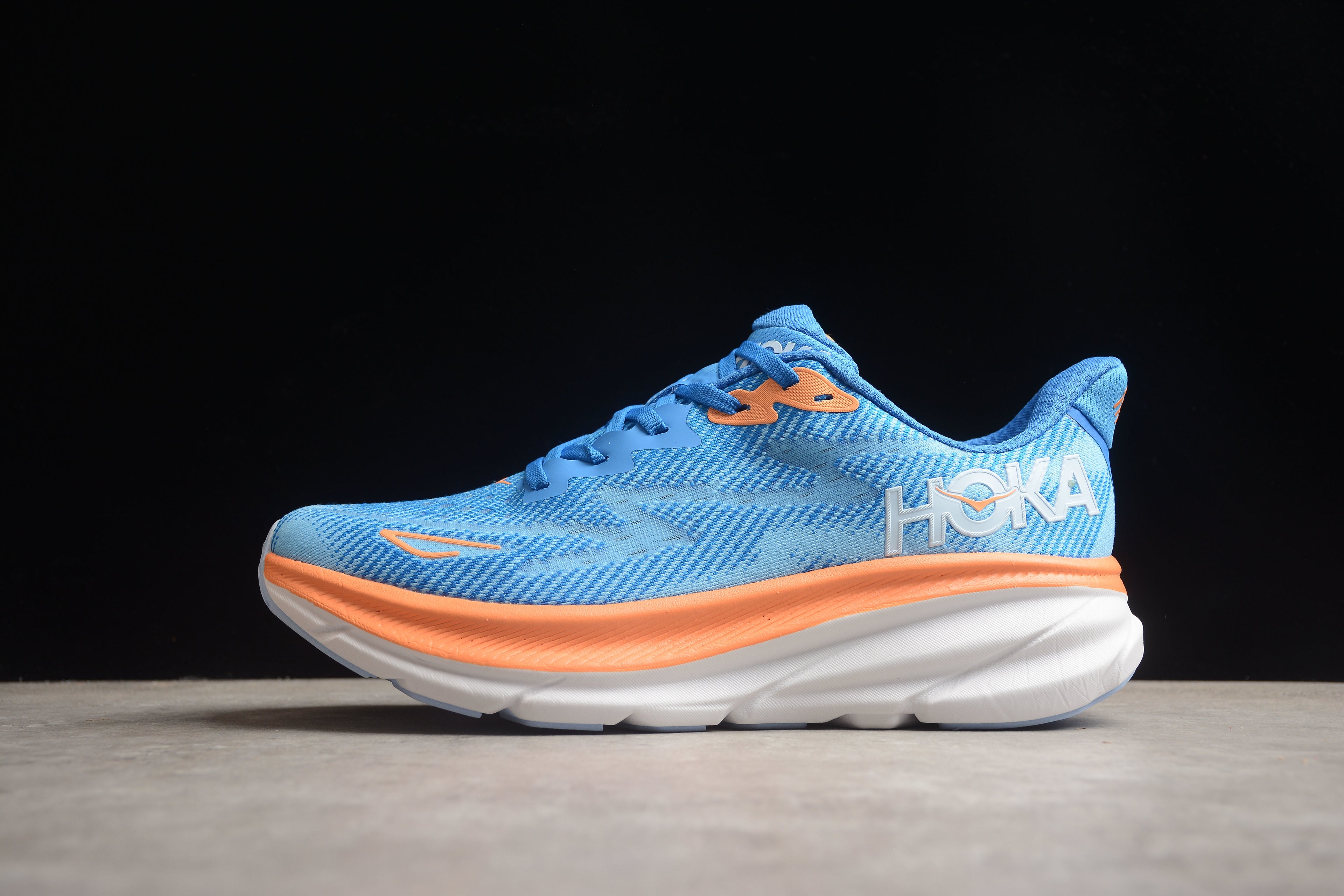 Hoka Clifton 9 – Azul / Naranja