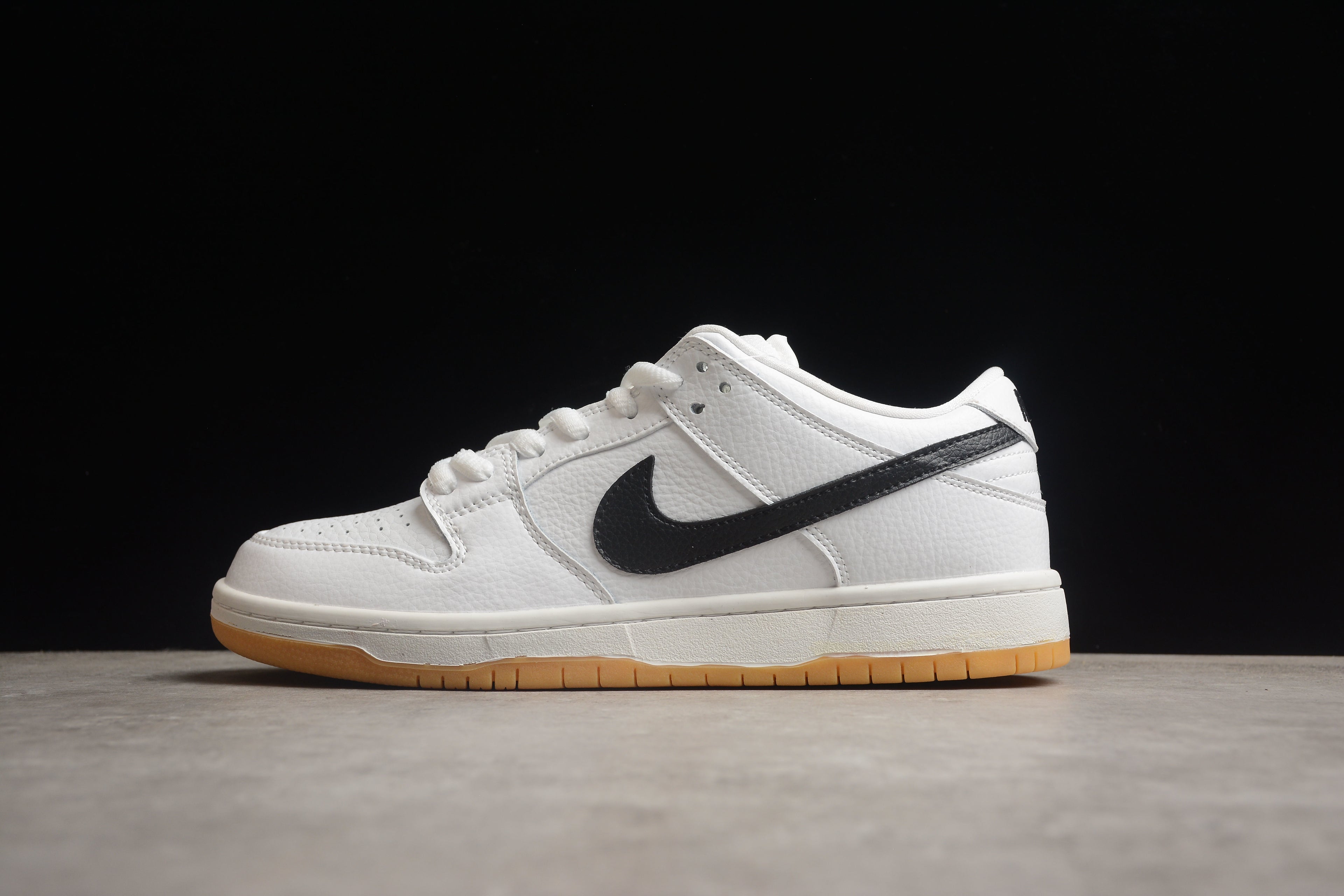 Dunk SB – Blanco / Negro