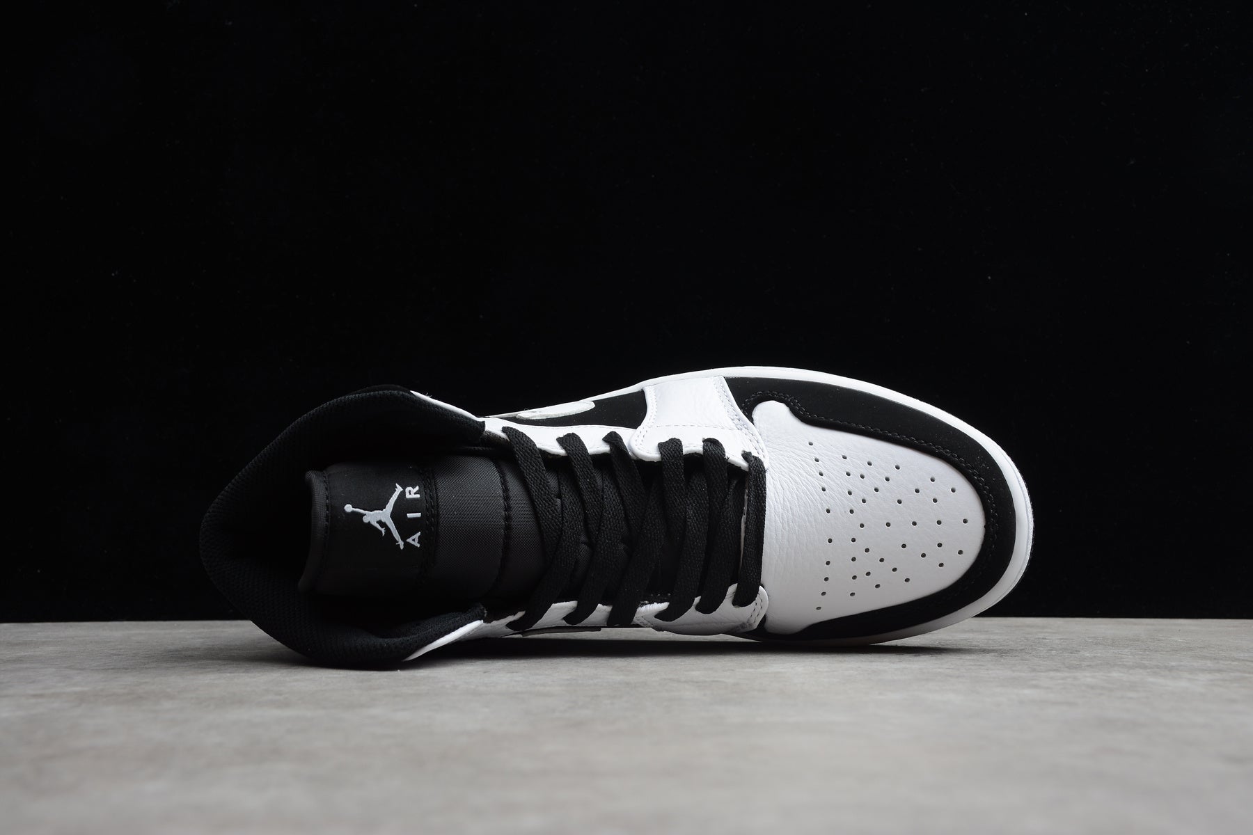 Air Jordan 1 Mid – Blanco / Negro