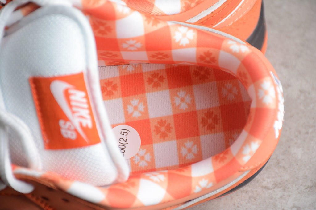 Dunk SB – Naranja / Blanco / Negro