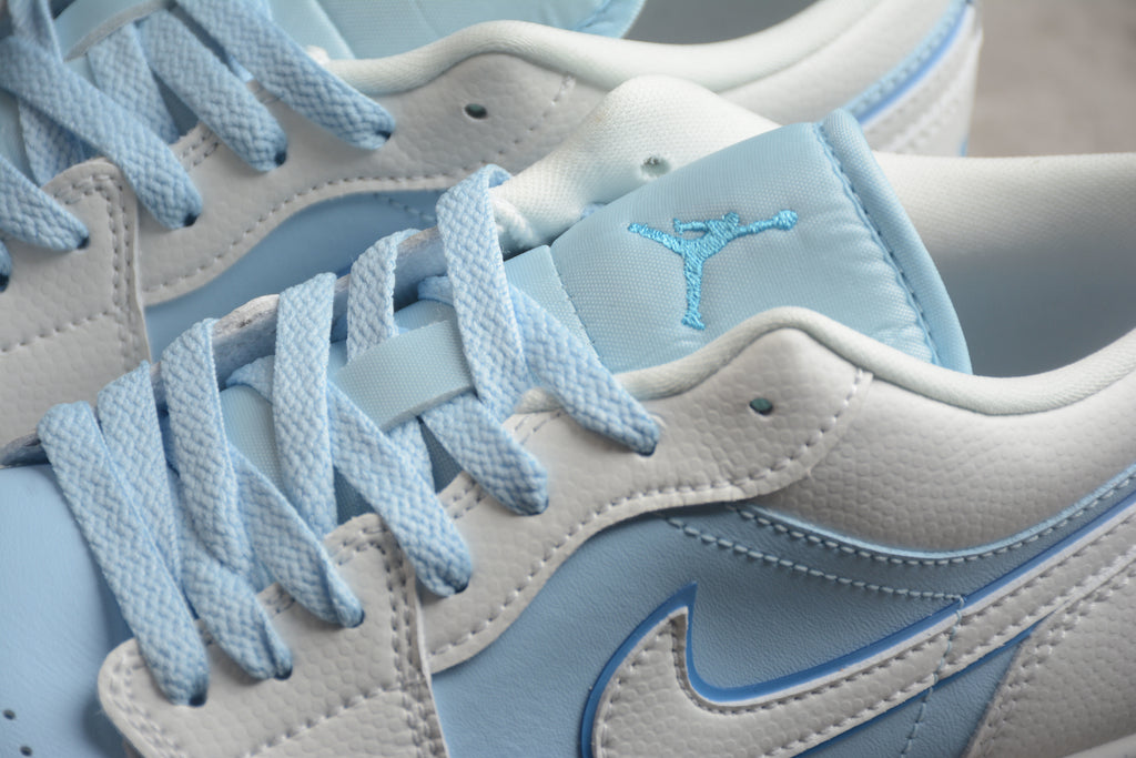 Jordan 1 Low – Blanco / Azul